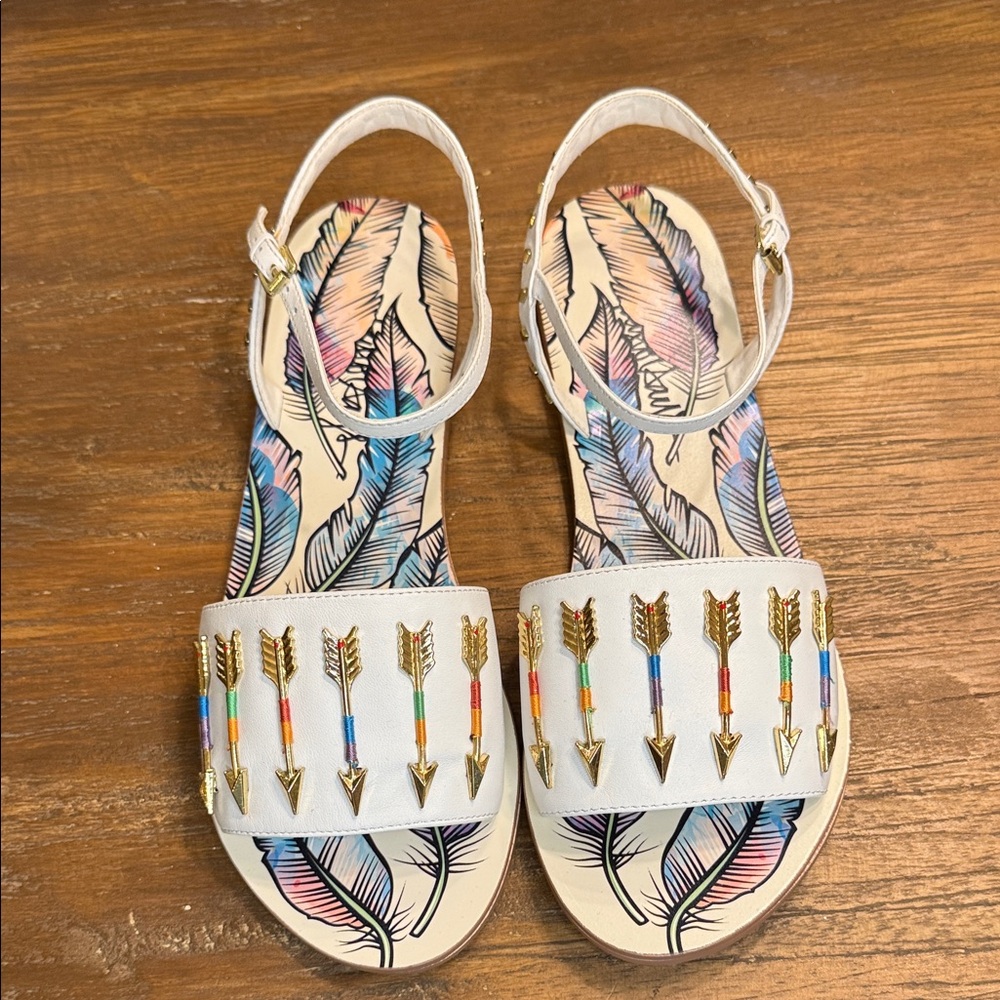 Taylor Says Talulah Arrow and Feather Sandals